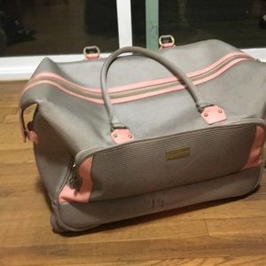 Tommy Bahama rolling duffel (carry-on size).